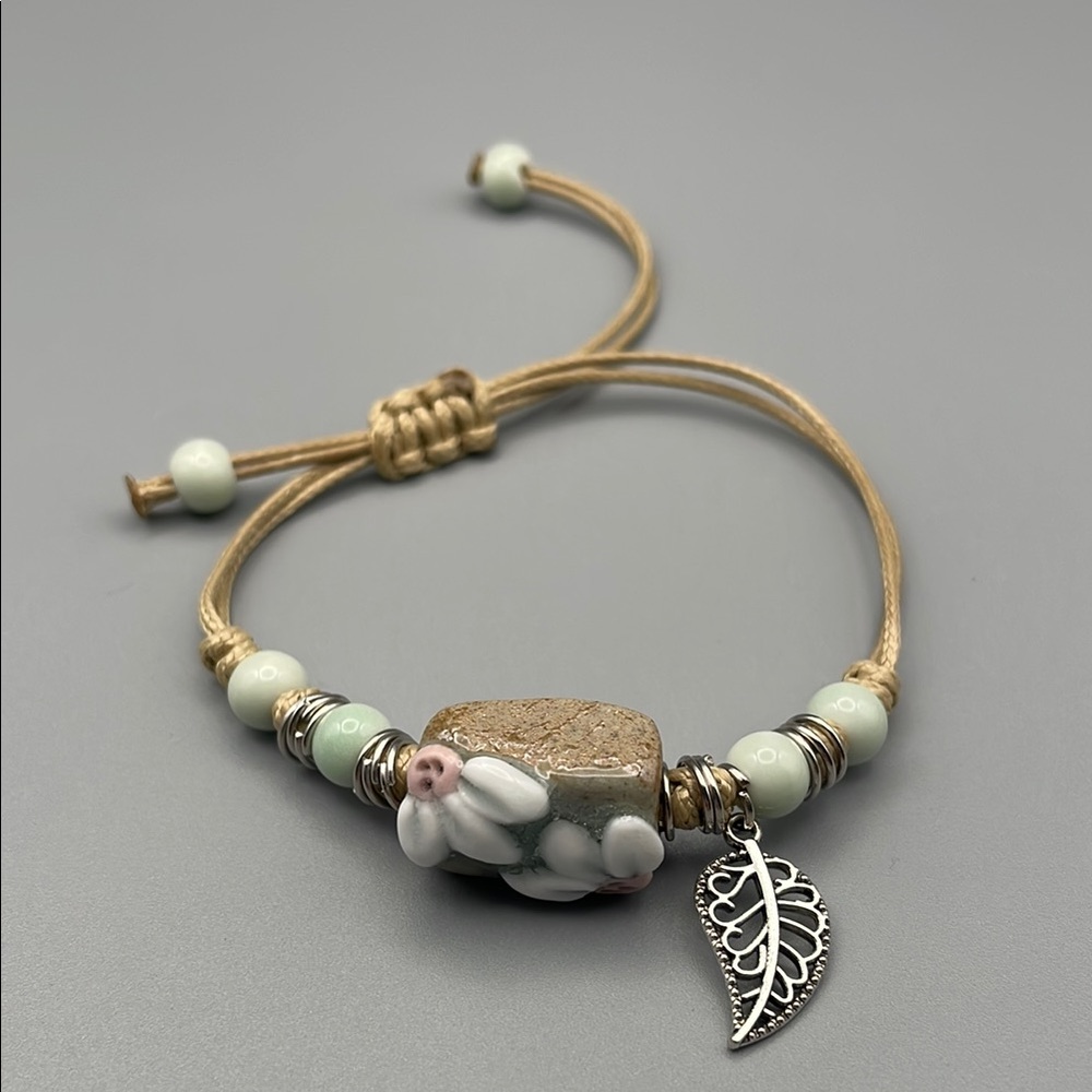 Floral Charm Bracelet with Silver Leaf Accent